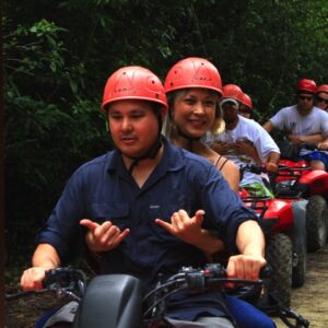 Adventurous tourists enjoying ATV rides, ziplining, horseback riding, and exploring cenotes in Cancun, Riviera Maya, and Playa del Carmen.